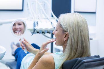 cosmetic dentist rutland | woman after a full smile makeover