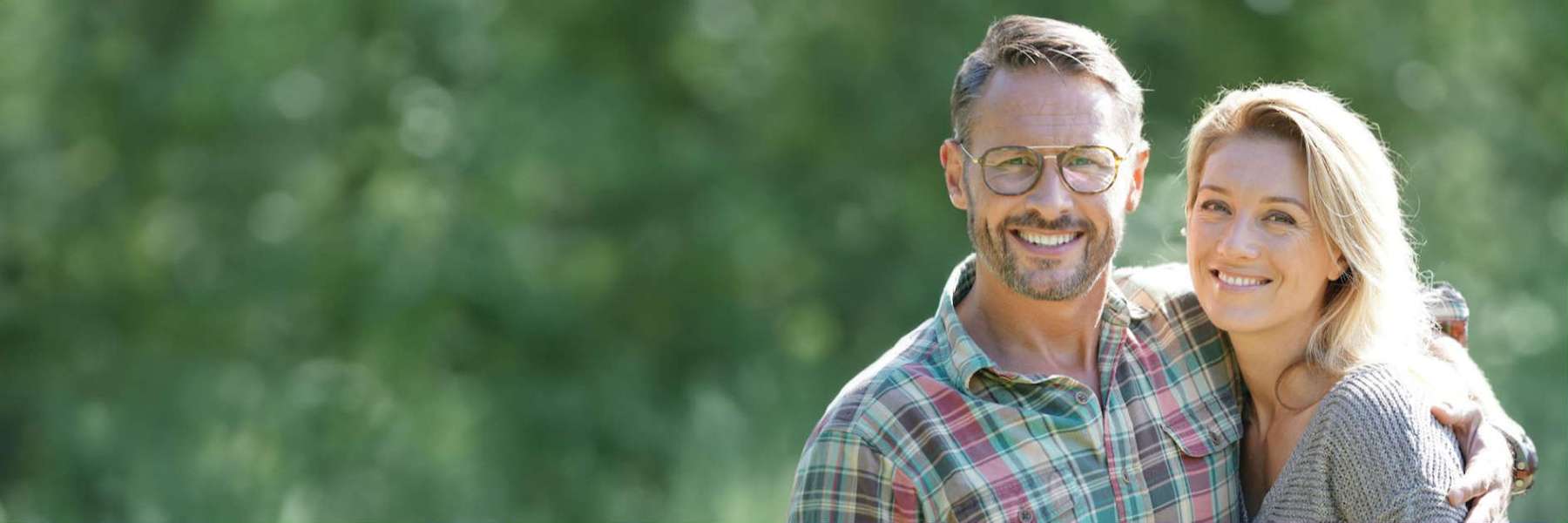 couple smiling in Rutland after visiting dentist for cleaning and exam