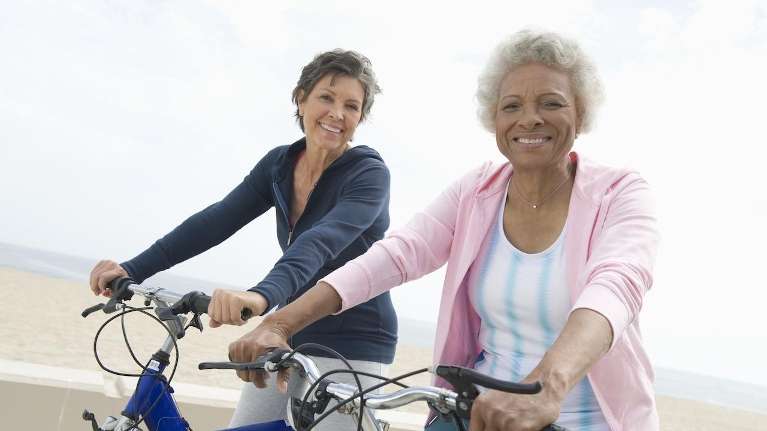 Two elderly women cycling in Rutland